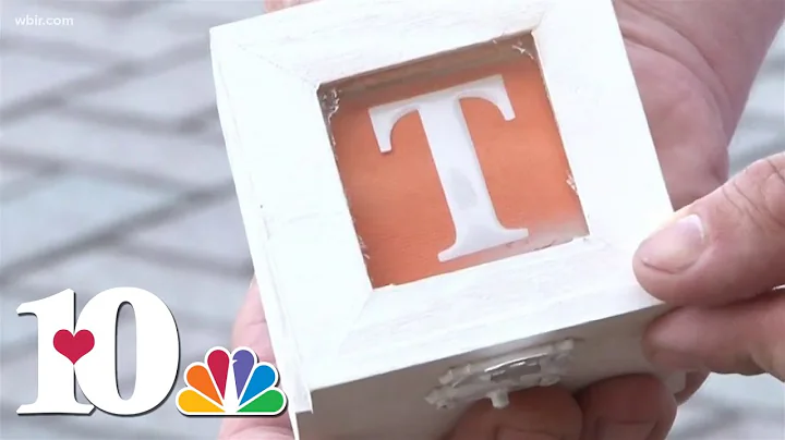 She said yes! Fan proposes on 50-yard line at Neyland