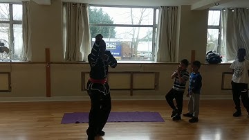 Kung Fu Training for Children Forward Roll Using Mantis Guard Sifu Bryan Barnes