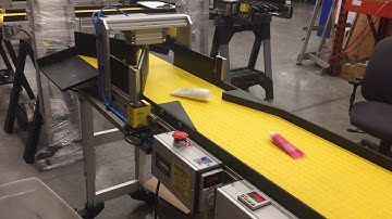 Center Flip And Counting Conveyor by SmartMove® Conveyors
