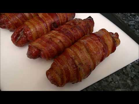 Smoked Bacon Wrapped Bratwurst with a Onion Kraut Slaw