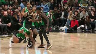 Marcus Smart with a right leg injury goes down hard on his own, helped off the court
