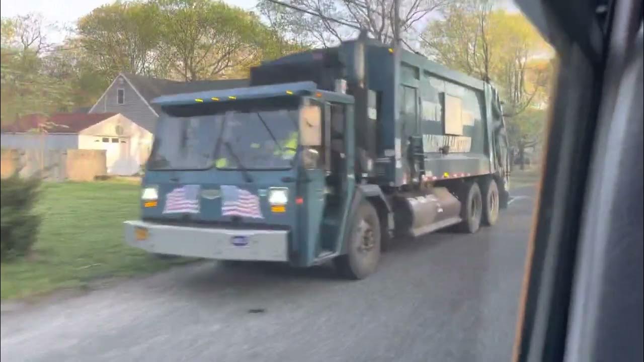 Passing Town of Brookhaven Bianculli Sanitation CCC Heil Garbage Truck