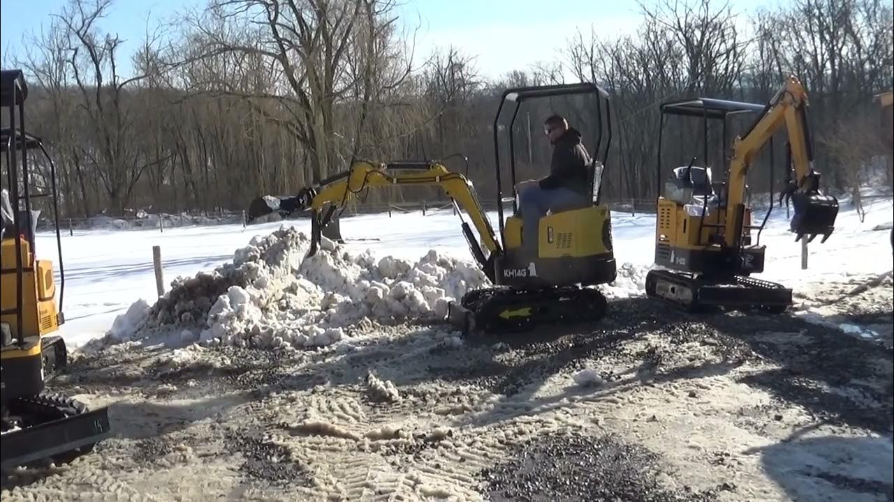 GroundHog KH14G mini track excavator with 32" bucket operational video