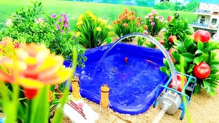 Water is being supplied to the pond with a water machine.#tractor