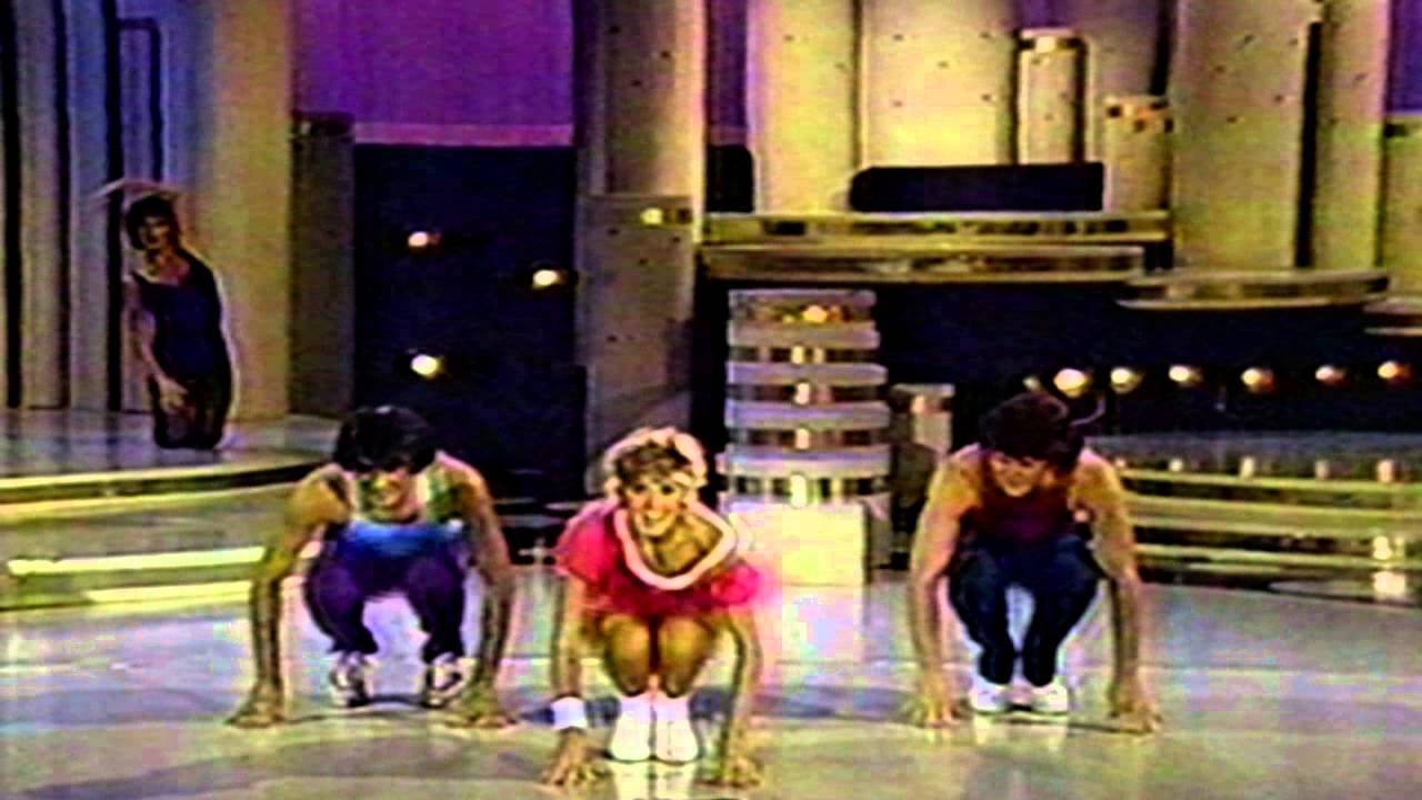 Olivia Newton John (Let's Get Physical), workout clothes and leg warmersso  1980s