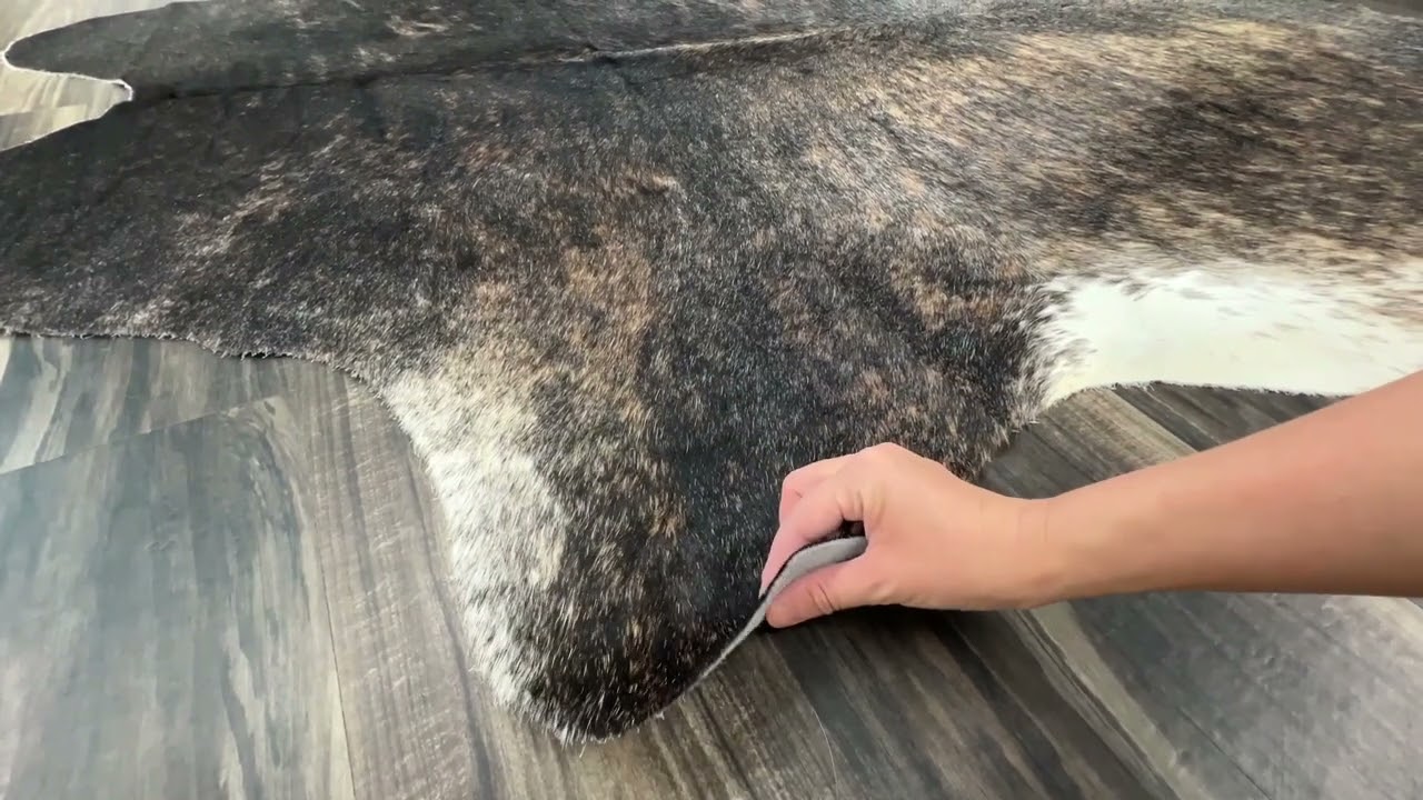 Unveiling the Rarity: Exotic Brindle Cowhide Rug for Elite Home Decor