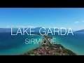 Sirmione, City Tourist Place on Lake Garda, Italy. Aerial drone 4K video. Calm Relaxing Music