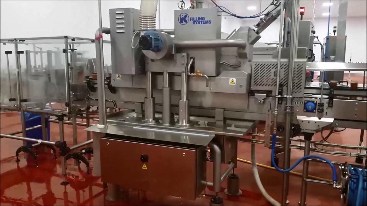 IC FILLING SYSTEMS   Rotary piston filler for food sauces plus Linear Twist off capper