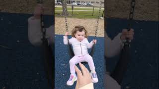 Little girl on swings asks her Mom to push faster then she falls off at playground