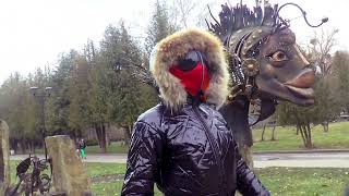 BLACK GLOSSY WARM SKI SUIT (SOLID WINTER SUIT) WITH HOOD AND MASK WITH RESPIRATOR AND GLASSES.