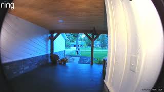 Little girl walks down stairs in front of house then gets hit by soccer ball (Security camera)