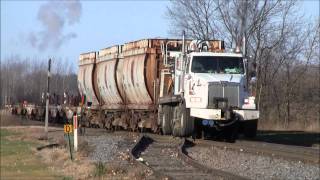CN Hi-Rail Boom Truck Pulling Wisconsin Central Rail Flats and Gondolas CN Hi-Rail Boom Truck Pulling Wisconsin Central Rail Flats and Gondolas