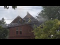 Firefighters ventilate an attic at 813 sheridan st in bay city officials believe a fire started in