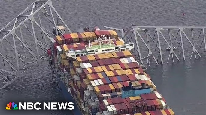 View From The Air Of The Collapsed Bridge And The Cargo Ship