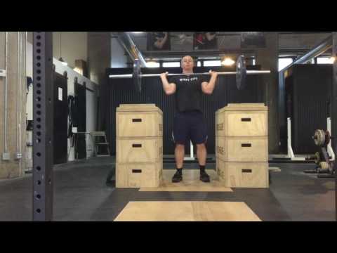 Jerk off the blocks; 60 kg.