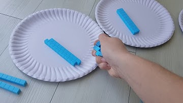 Long division with remainder using base 10 blocks