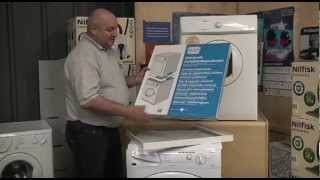 Universal stacking kit for washing machine and tumble dryer