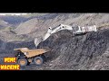 LIEBHERR 9100 EXCAVATOR LOADING CATERPILLAR DUMPERS