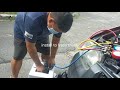 Freon charging process for car Air-conditioning with uv dye and adding compressor oil.