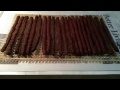 Beef Sticks cured then smoked in the Big Chief Electric Smokehouse