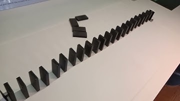 SLOW MOTION DOMINOES FALLING
