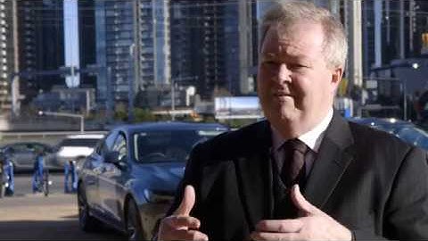 Why are the auto manufacturers involved in these automated vehicle trials?