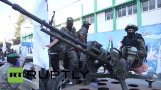 News - State of Palestine: Al-Qassam Brigades parade remembers three killed leaders