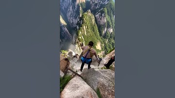 Thumbnail of Mountain Collapses While Climbers Are Still on It