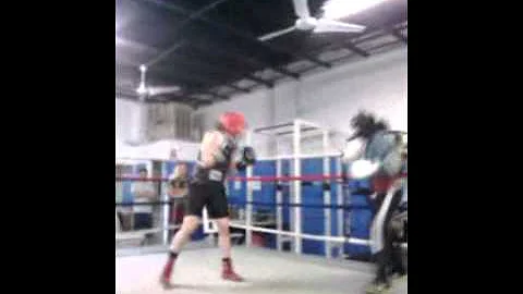 Amateur boxer Teri Hobson (red head gear)