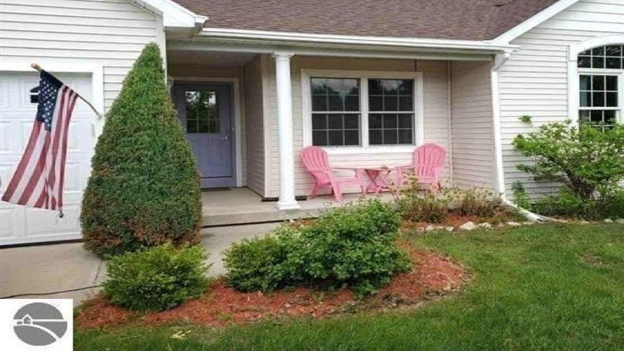 07155 APPLEWOOD DRIVE, CHARLEVOIX, MI Presented by Mark Knapp.