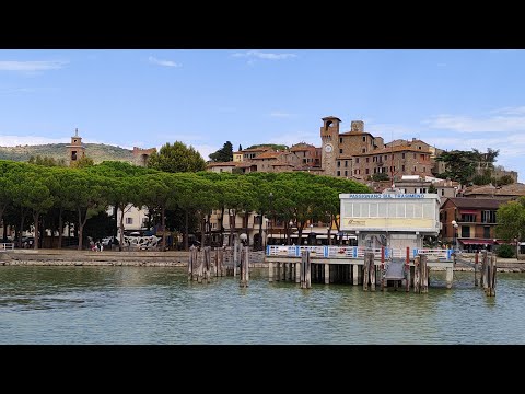 MOPEG’s 4K HDR walking tour is a slow visual route through Passignano, published on 24 September 2021. Its strength is spatial: the viewer can see how the waterfront, older lanes and rising ground fit together, helping plan an unhurried walk from the landing toward the Rocca. The footage is a creator’s travel film, not an official record, and it does not replace current information about opening hours, accessibility or transport. Use it to get a feel for the town’s scale, then check the Comune’s visitor pages before setting out.