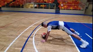 HIGH PLANK   ARM MOVING ABOVE THE BALL FROM FORWARD AND BACKWARD