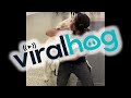 Super Excited Doggo Dives in for Airport Reunion || ViralHog