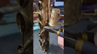 How to remove a sax spring from a post. #saxophone #instrumentrepair #banddirector