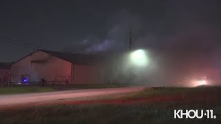 Raw Video: Car crashes into building leading to 2-alarm fire in southeast Houston