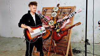 Thumbnail for Self Playing Robo Guitars Made Out Of Junk - Junk Rock TV