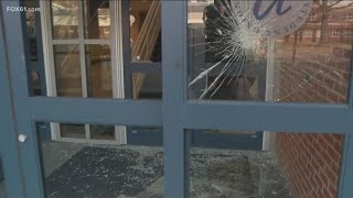 Glass shattered at UConn student union entrance after championship victory mayhem