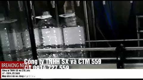 Máy chiết rót và đóng nắp chai dầu ăn - Mr. Chiến 0914727559