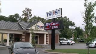 Credit Union Robbed, Motorist Hits Responding Officer's Vehicle