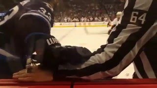 Dustin Byfuglien front row view hit on mark stone