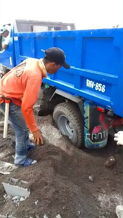 bogged dump truck in the mud#short