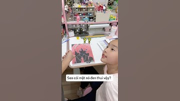 Em gái vẽ bức tranh biết đảo ngược màu