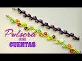 PULSERA con CUENTAS/MOSTACILLAS en forma de FLOR EFECTO RAMAS.