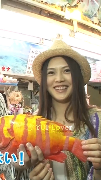 YUI visits a sea market in Okinawa with YAMATO from Orange Range (2012)