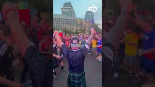 Boston police officer celebrates World Cup with fans