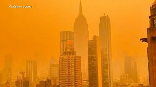 Smoke from Canadian wildfires turns New York City skyline orange