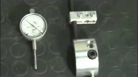 Installation of a centesimal dial gauge indicator installation for measuring the inside diameter