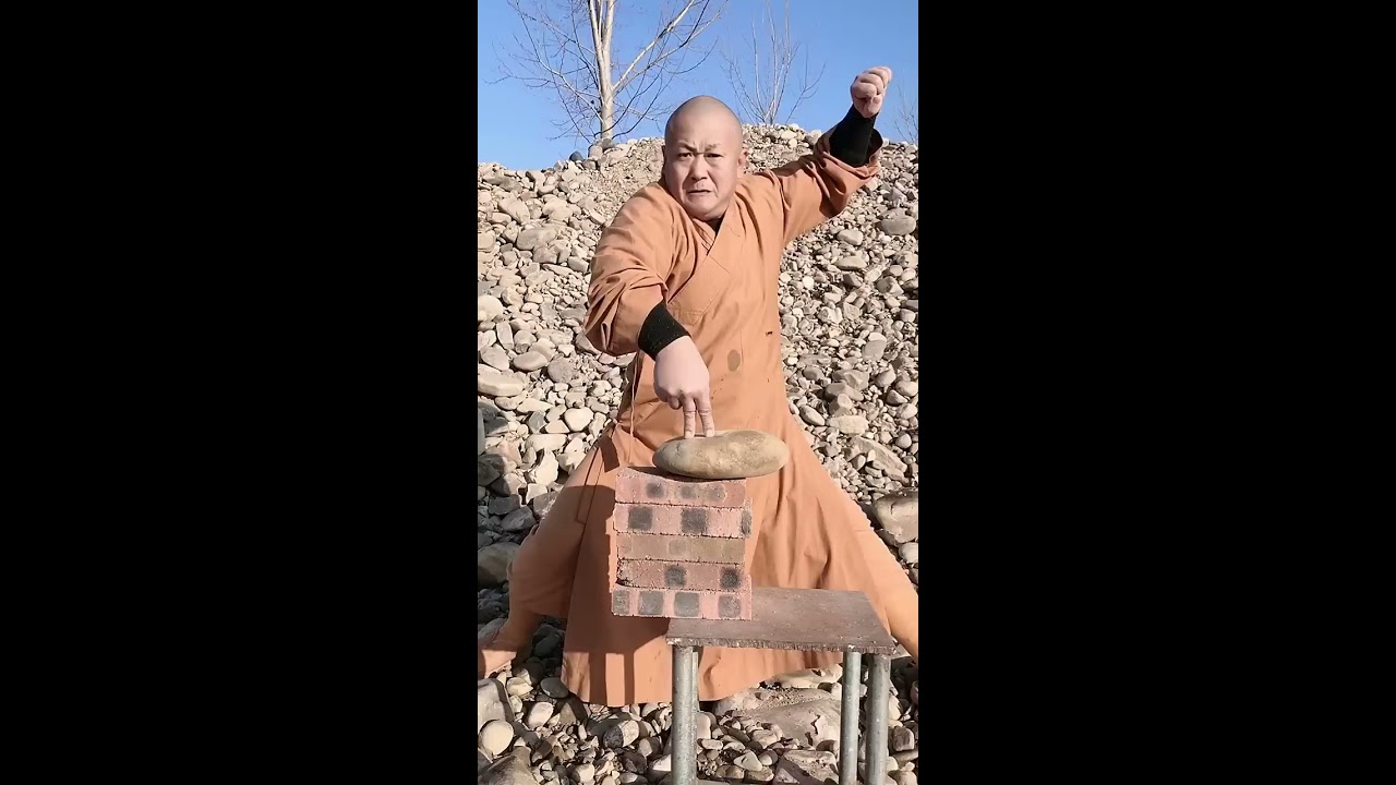 Kung Fu Monk Performing Shaolin hard Qigong