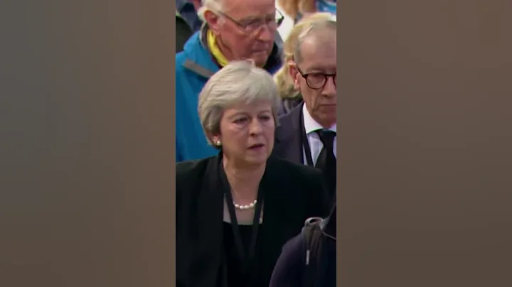Theresa May Curtsies to Queen One Last Time