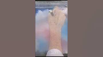 Watch Bob Ross paint happy little clouds